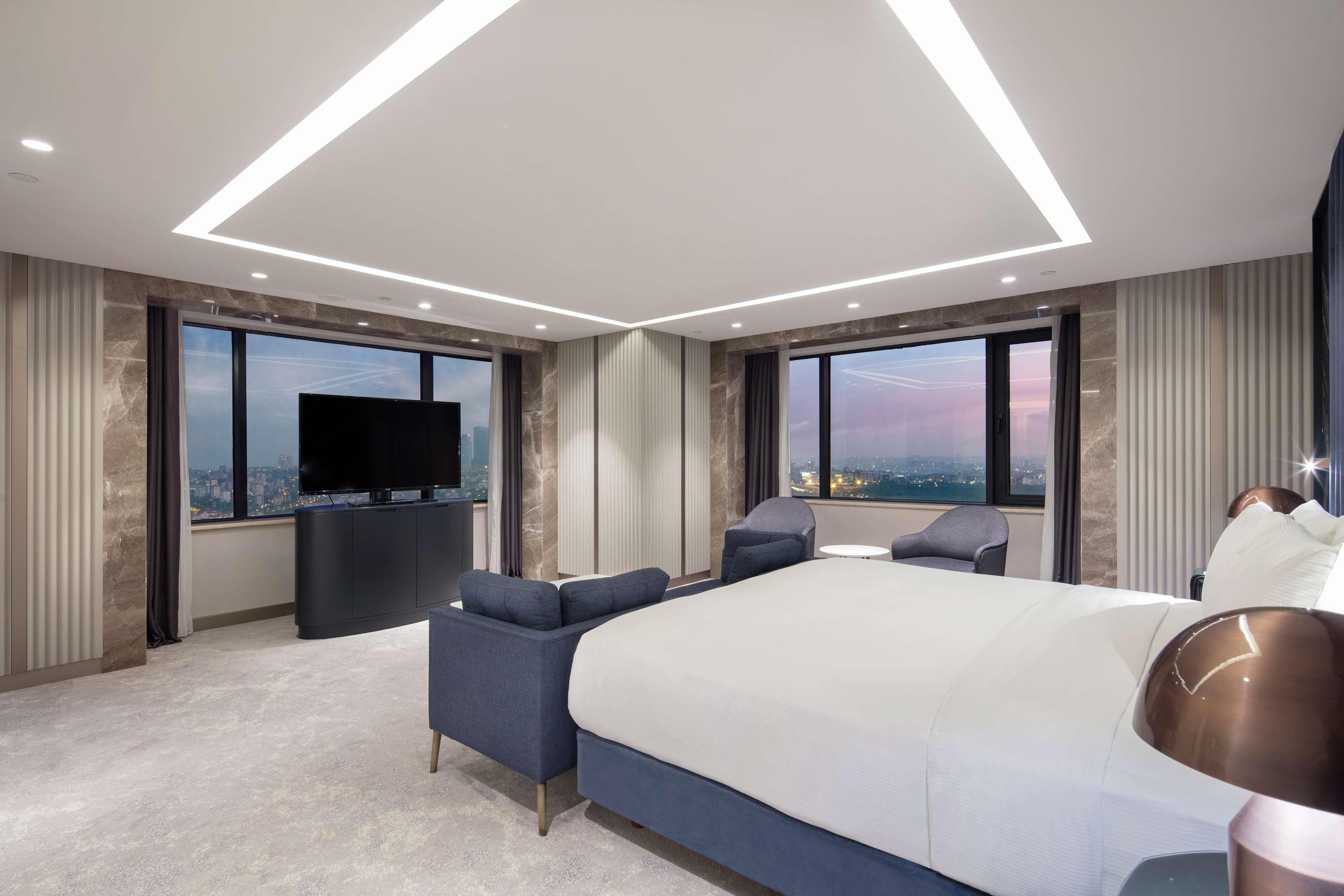 Hilton Istanbul Maslak Hotel Exterior photo A bedroom at the hotel